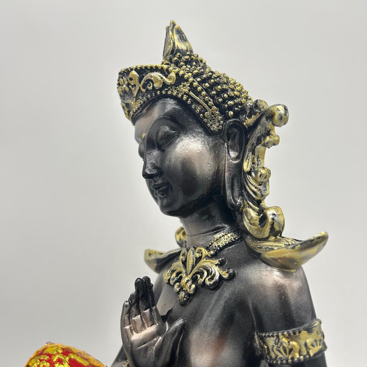 Thai Buddha Statue Sitting on Pedestal