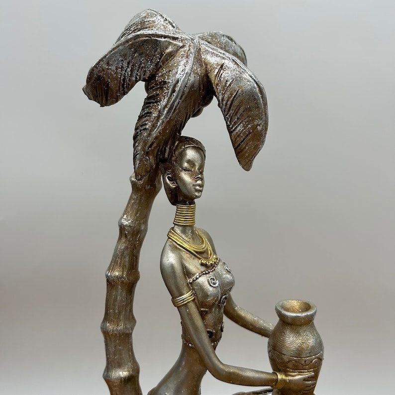 12" African Women Holding Pot Sitting under Coconut Tree Figurine